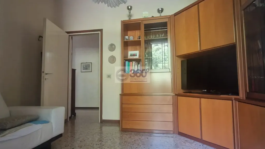 Séjour - Quadruplex Apartment with Garden View in Brescia