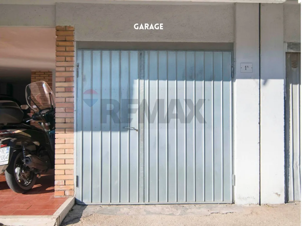 Garage - Three-Bedroom Apartment with Terraces in Roccastrada