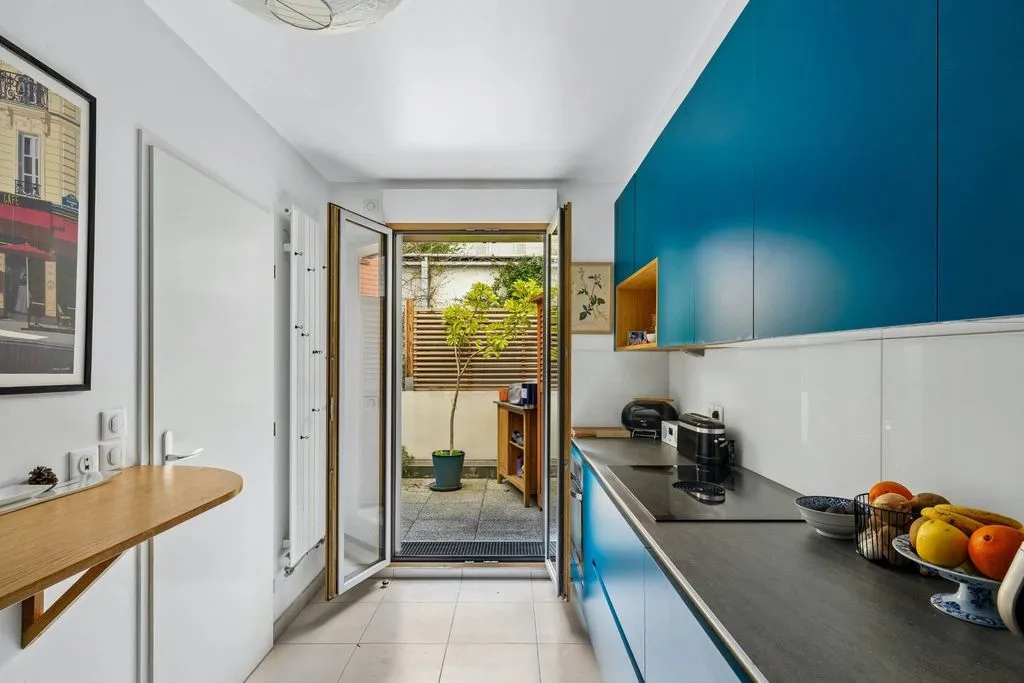 Cuisine - Appartement Luxe avec Jardin Privé à Paris