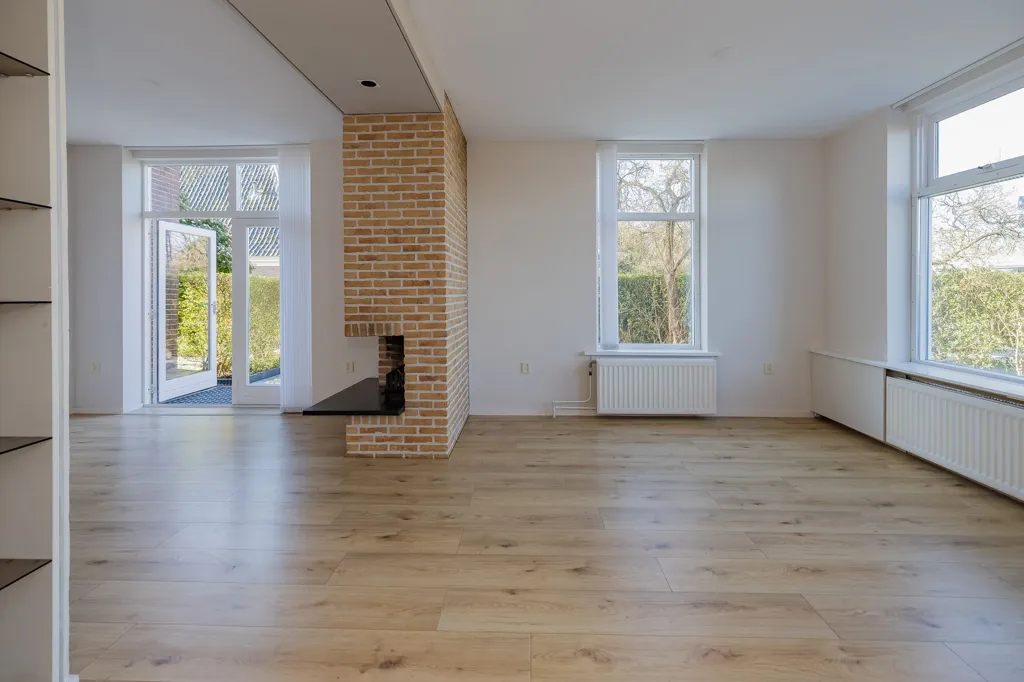 Séjour - Sustainable Dijkwoning with Sluice View in Spaarndam
