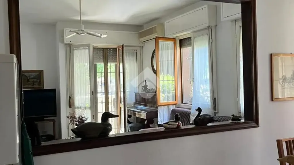 Living Room - Three-Bedroom Apartment with Balcony in Melegnano