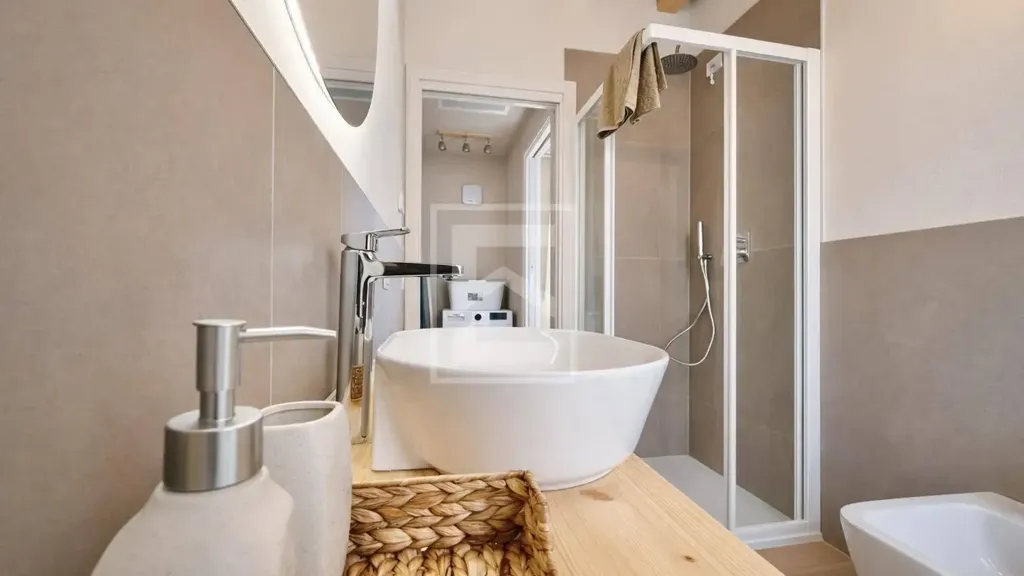 Bathrooms - Restored Triplex with Garden View in Manerba del Garda