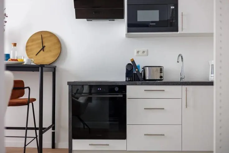 Cuisine - Appartement 1BR avec Rendement Immédiat au Centre de Bruxelles