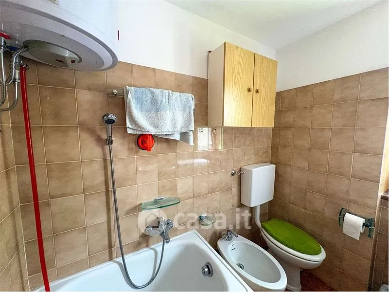 Salles de bain - Mountain View Apartment with Private Garage in Campodolcino