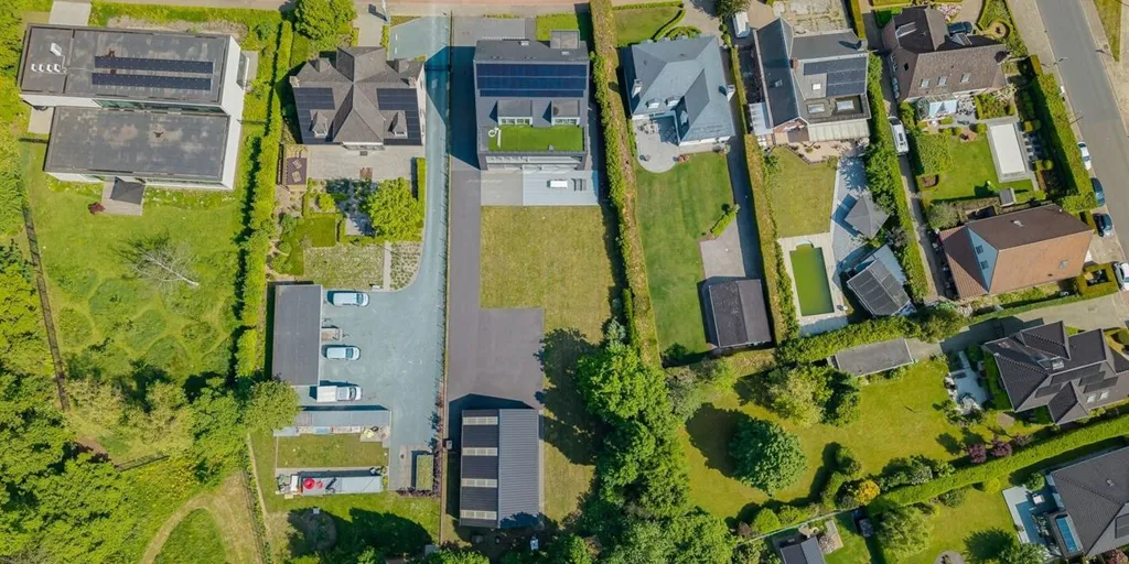 Aerial - Mixed-Use Building with Showroom in Borsbeek