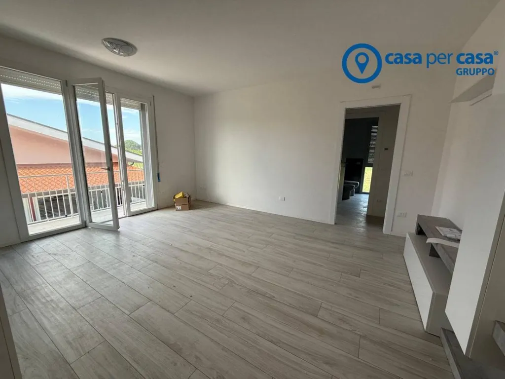 Séjour - Newly Built Apartment with Private Garden in Porto Viro