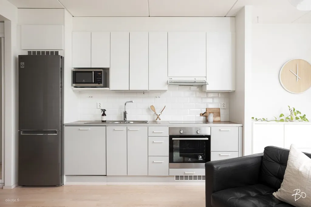 Kitchen - Modern Apartment with Balcony in Jyväskylä Centre