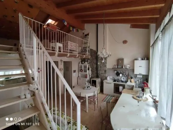 Terraced House with Wood Features in Cimbergo