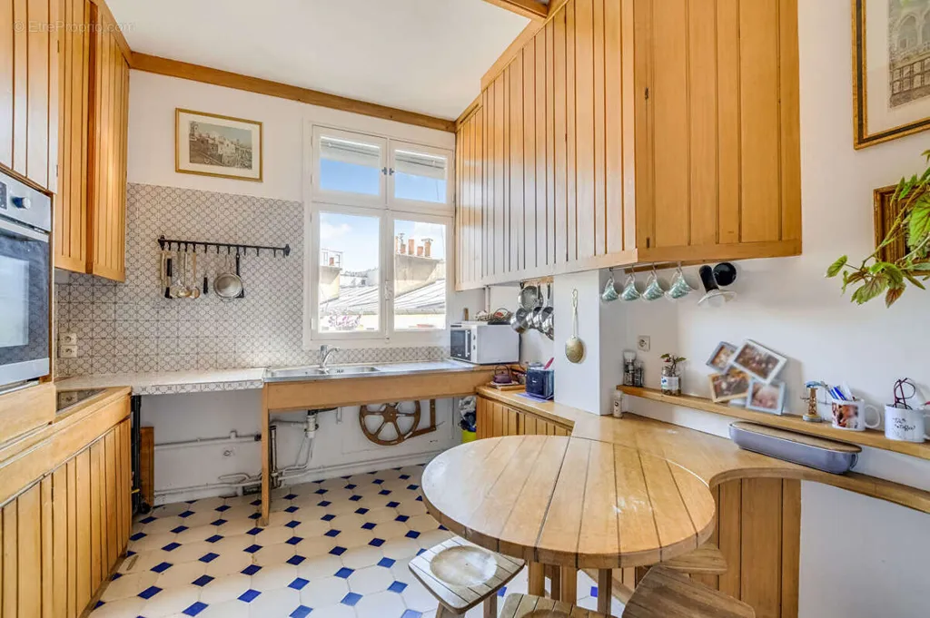 Cuisine - Appartement 3/4 Pièces avec Vue Dégagée à Paris 19