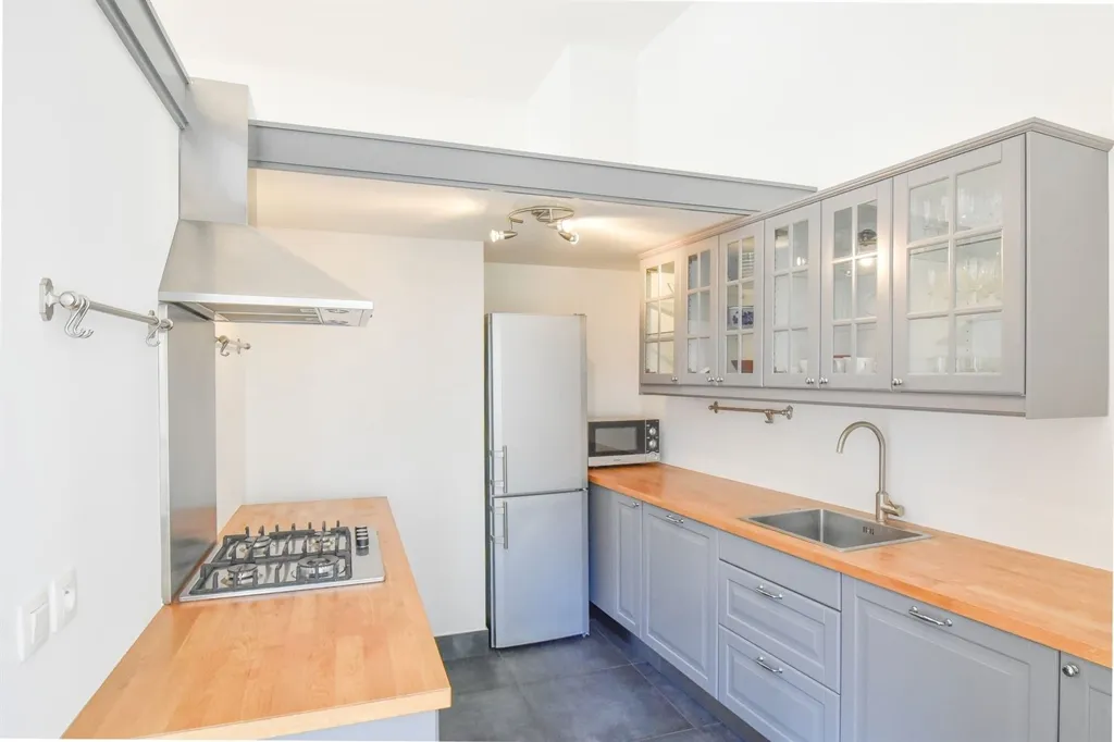 Cuisine - Appartement avec Parquet et Cheminée à Sablon