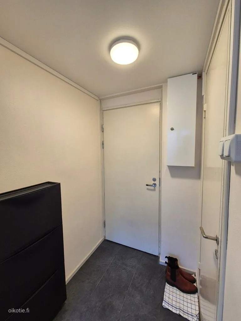 Entrée - Modernised Studio with East View in Töölö, Helsinki