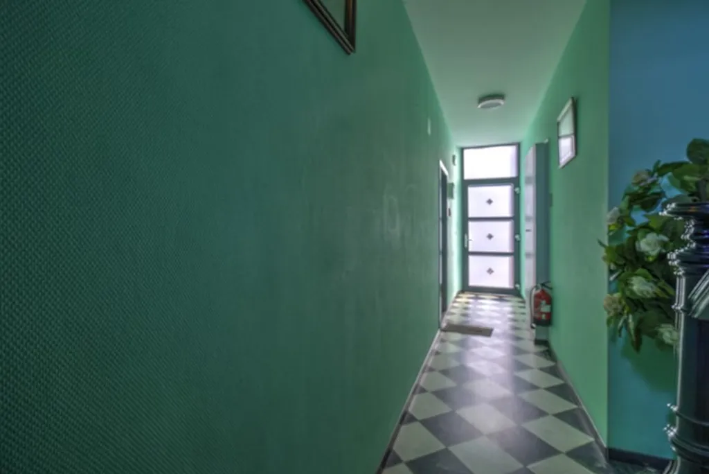 Esik - Two-Bedroom Apartment with Garden Access in Saint-Nicolas
