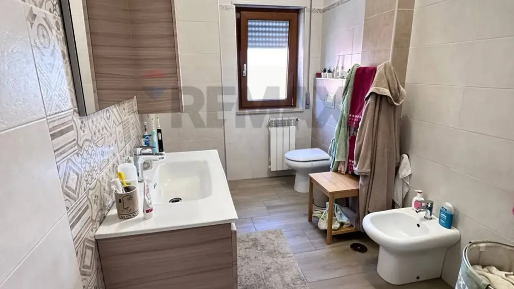 Bathrooms - Modern Apartment with Balcony in Cosenza