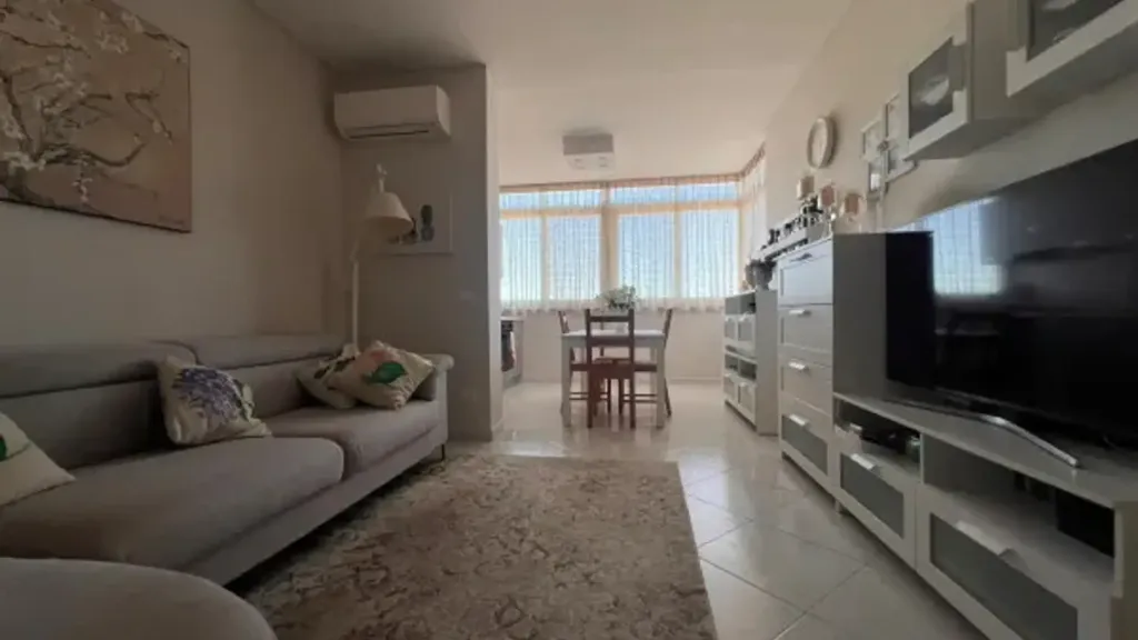 Living Room - Rearfacing Apartment with Balcony in Marsala