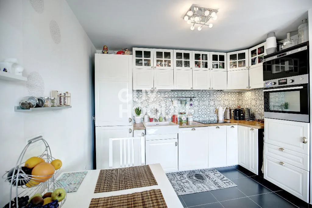 Cuisine - Appartement 3 Pièces avec Balcon à l'Ouest au Centre-Ville