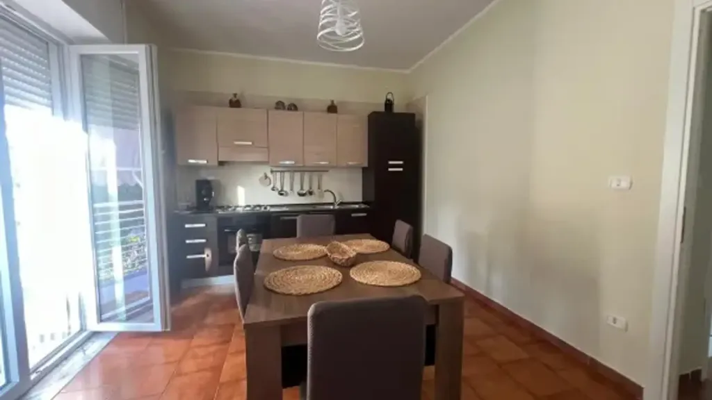Salle à manger - Three-Bedroom Apartment with Balcony in Giugliano