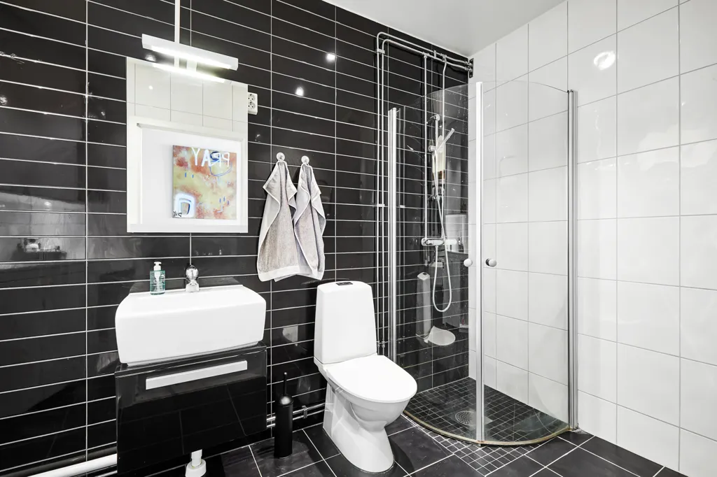 Bathrooms - Renovated Apartment with Balcony in Borås