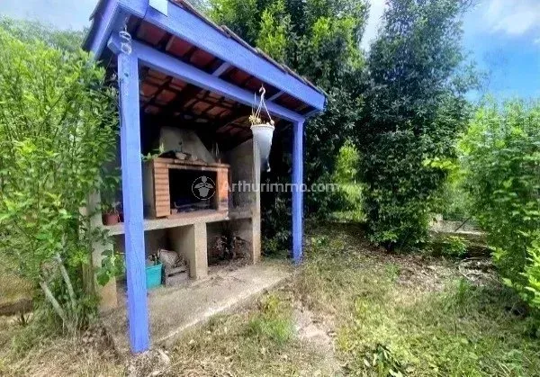Jardin - Maison 9 pièces à Burlats