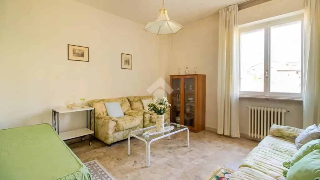 Séjour - Three-Bedroom Apartment with Balcony in Fermo