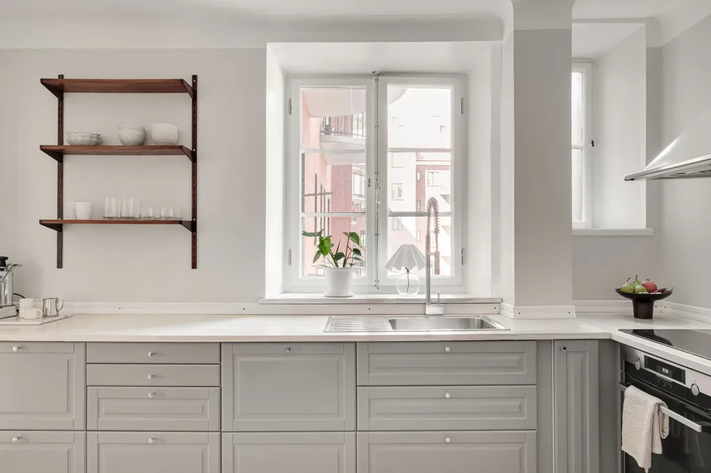 Cuisine - Charming Corner Apartment with Four-Directional Views in Kristianstad