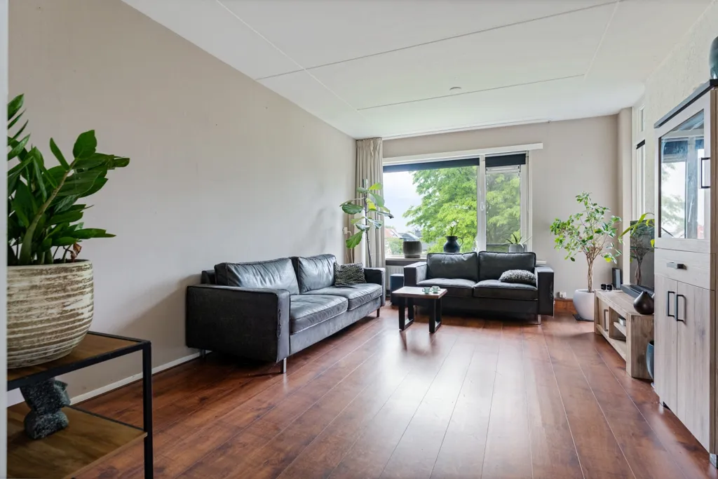 Living Room - 3-Bedroom Apartment with Balcony in Assen