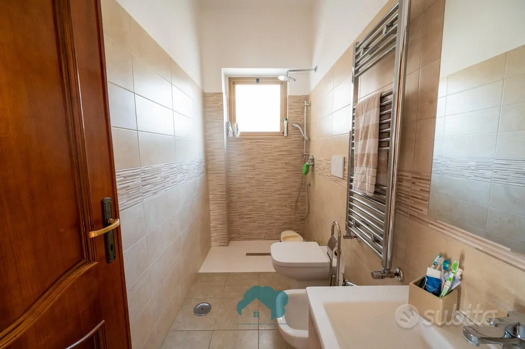 Bathrooms - Villa Portion with Courtyard in Poli