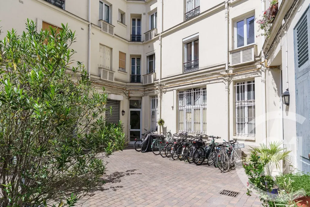 Jardin - Appartement Familial avec Moulures à Paris 19ème