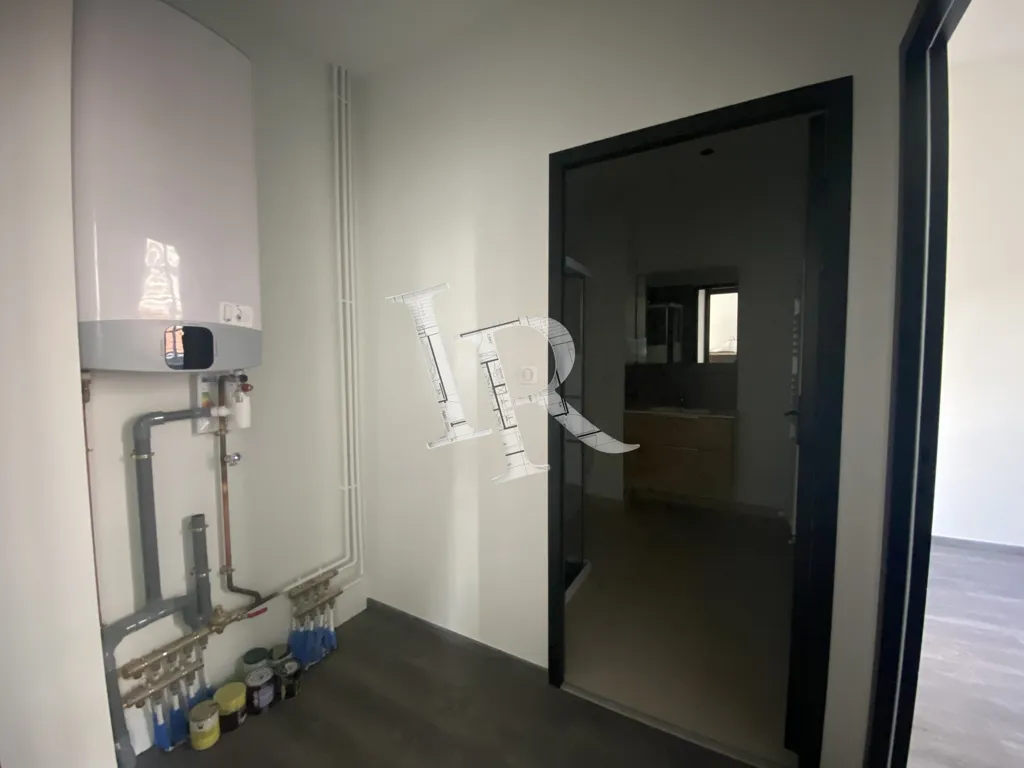Utility Room - Flat with Private Parking in Secure Residence