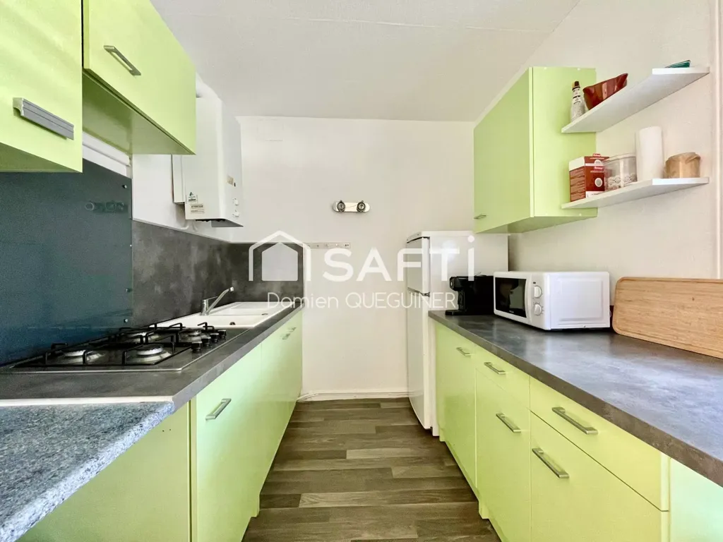 Cuisine - Appartement avec Balcon dans le Quartier de l'Aiguillon