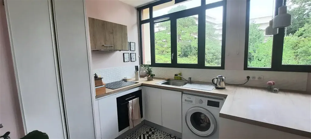Kitchen - Renovated 2-Bed Flat with Garden View in La Baule
