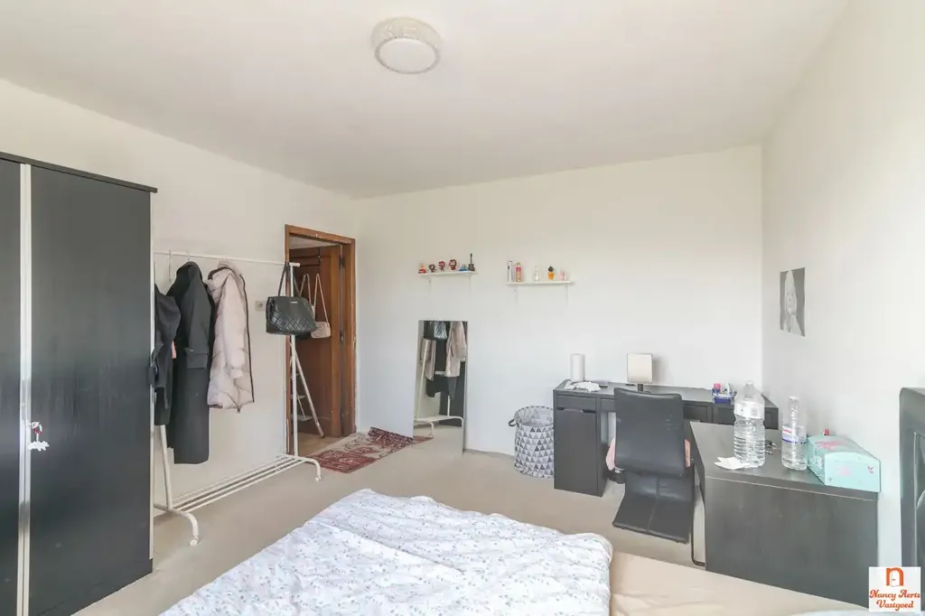 Bedrooms - Apartment Building with High Visibility in Herk-de-Stad