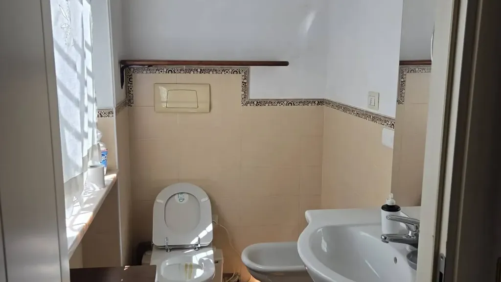 Salles de bain - Historic Building Apartment with Private Parking in Milan