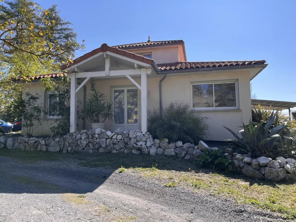 Exterior - House with Mountain View in Verdant Setting