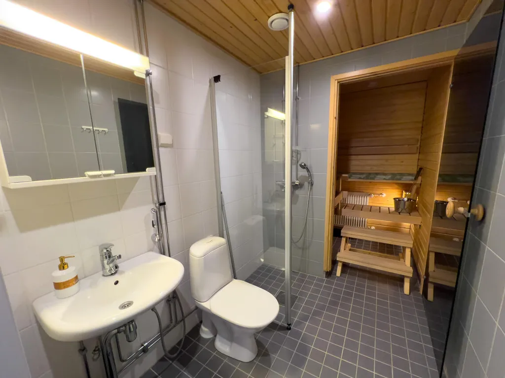 Bathrooms - Modern Studio with Balcony in Rovaniemi Centre