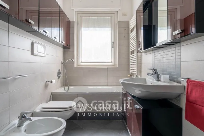Bathrooms - Modern Bilocale with Balcony in Monza