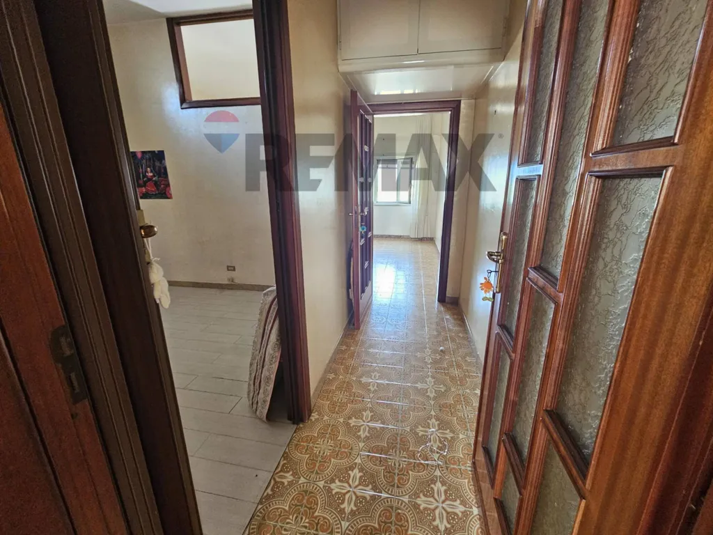 Esik - Three-Bedroom Apartment with Balcony in Afragola