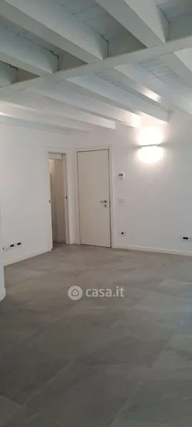 Rooms - Elegant Trilocale with Private Patio in Como