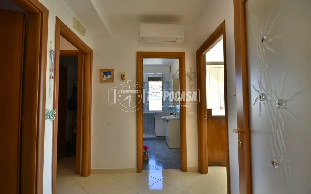 Esik - Renovated Flat with Balconies in Osimo