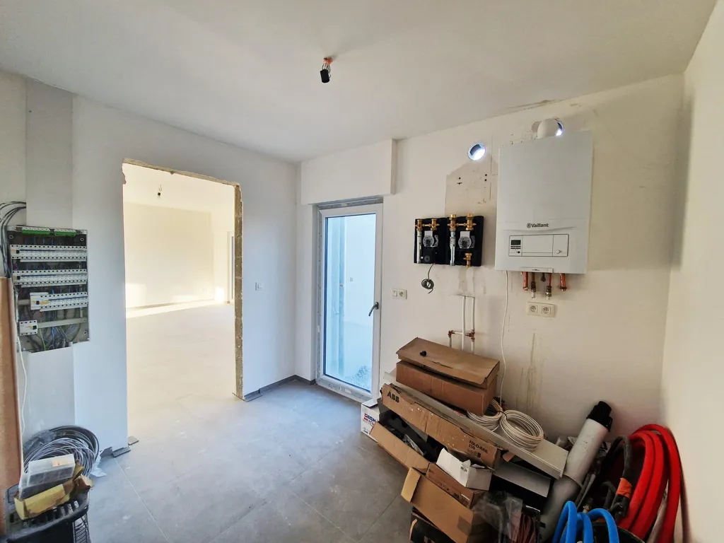 Buanderie - Maison neuve avec cinq chambres à Bertogne