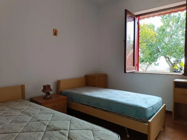 Schlafzimmer - Villa Apartment with Terrace in Bonifati