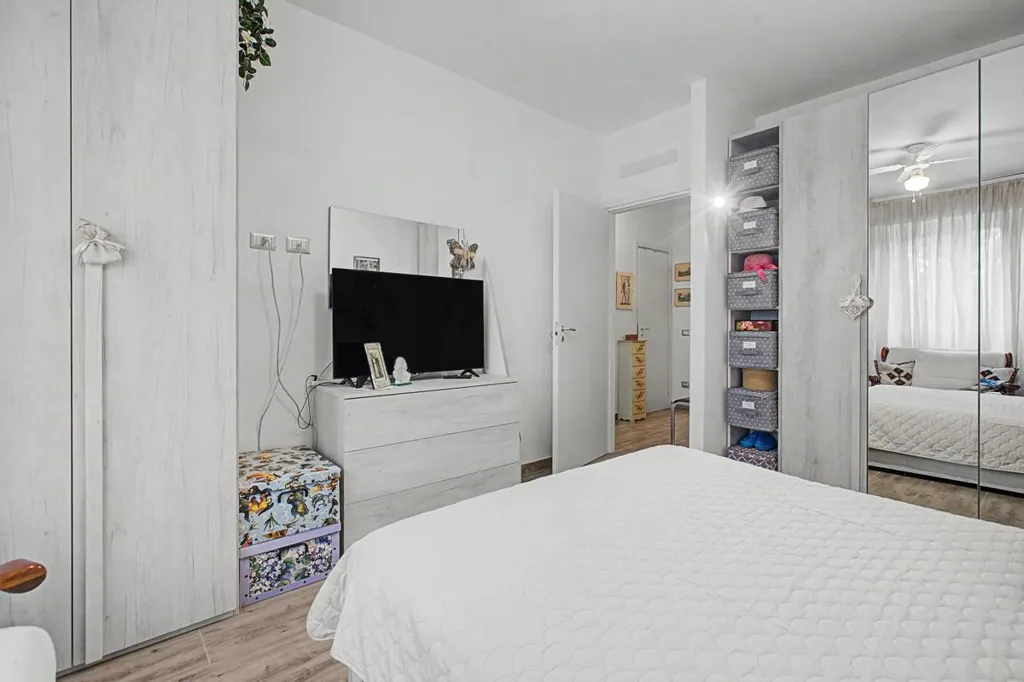 Bedrooms - Rear-Accessed Apartment with Parking in Milan