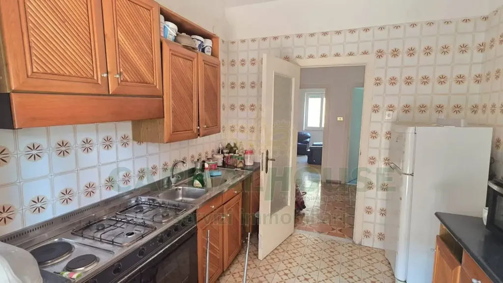 Cuisine - Three-Bedroom Apartment with Terrazzo in Caserta