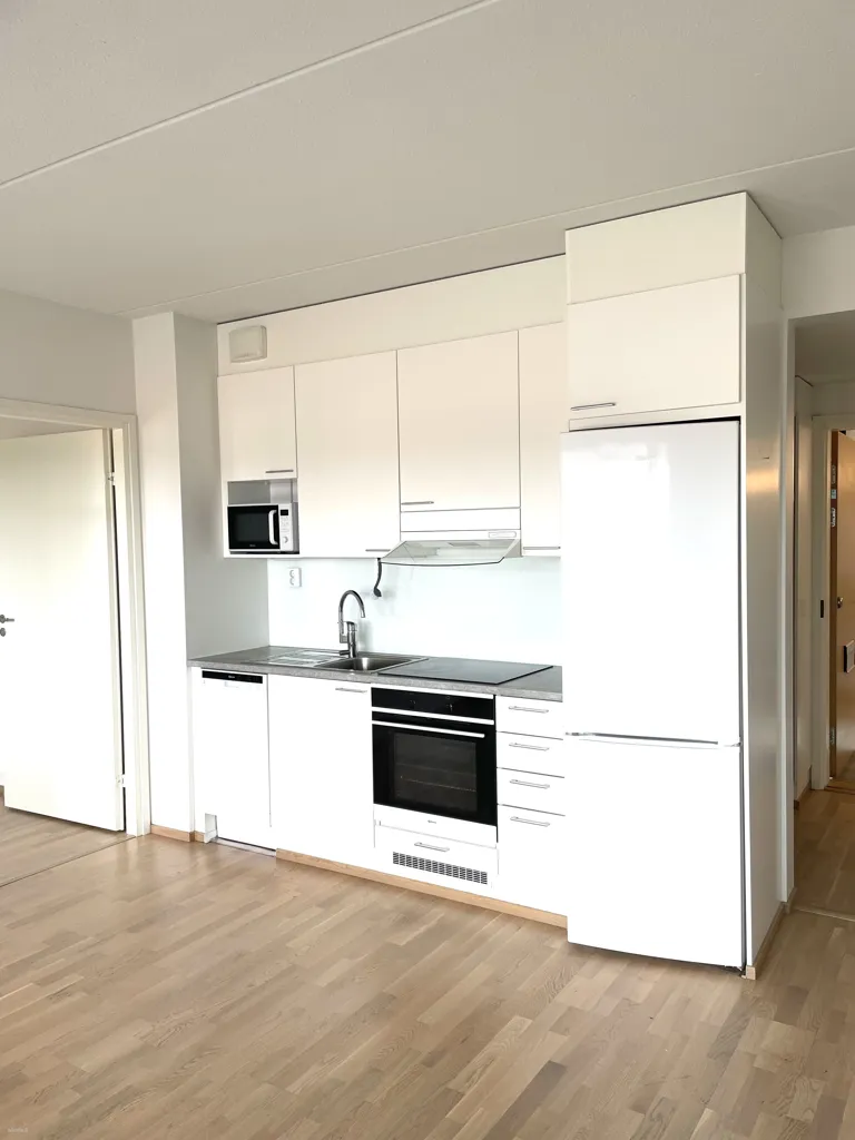 Kitchen - Bright Apartment with Balcony in Nummela