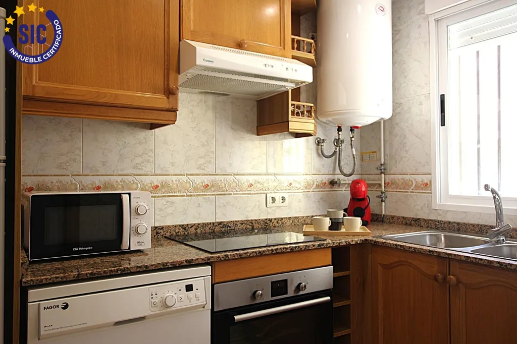 Köök - Beachfront Apartment with Sea View in Marina D'Or