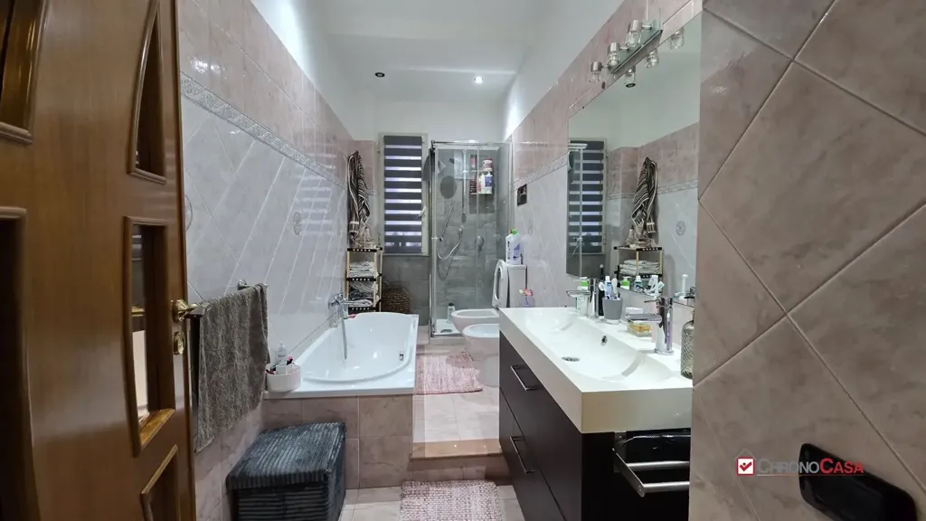 Bathrooms - Modernised Apartment with Balcony in Messina