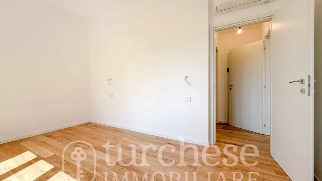 Bedrooms - Modernised Two-Bedroom Apartment in Bergamo