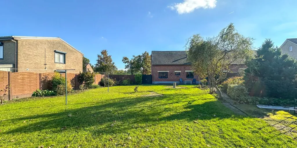Jardin - Appartement Charmant avec Garage à Heusden