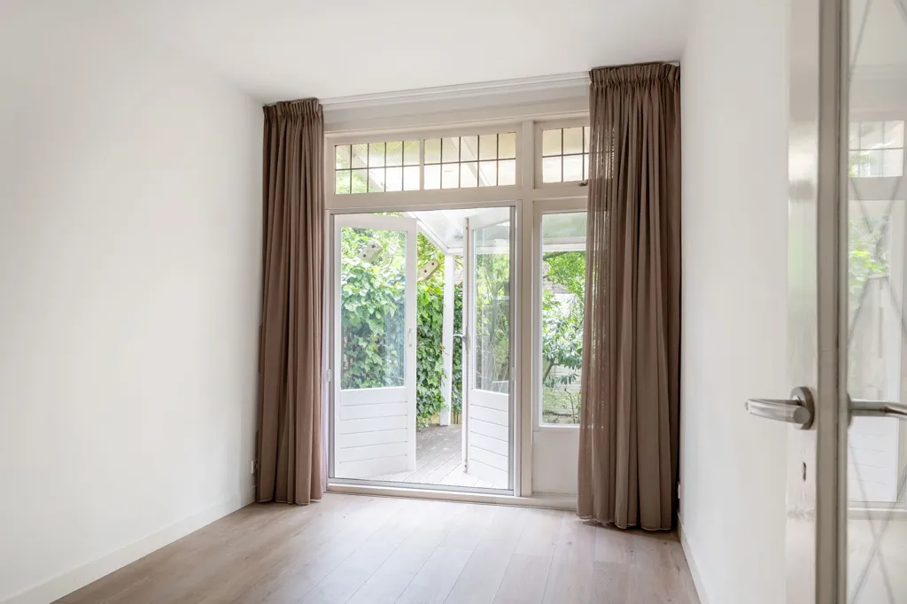 Chambres - Spacious Ground Floor Flat with South Garden in Blijdorp