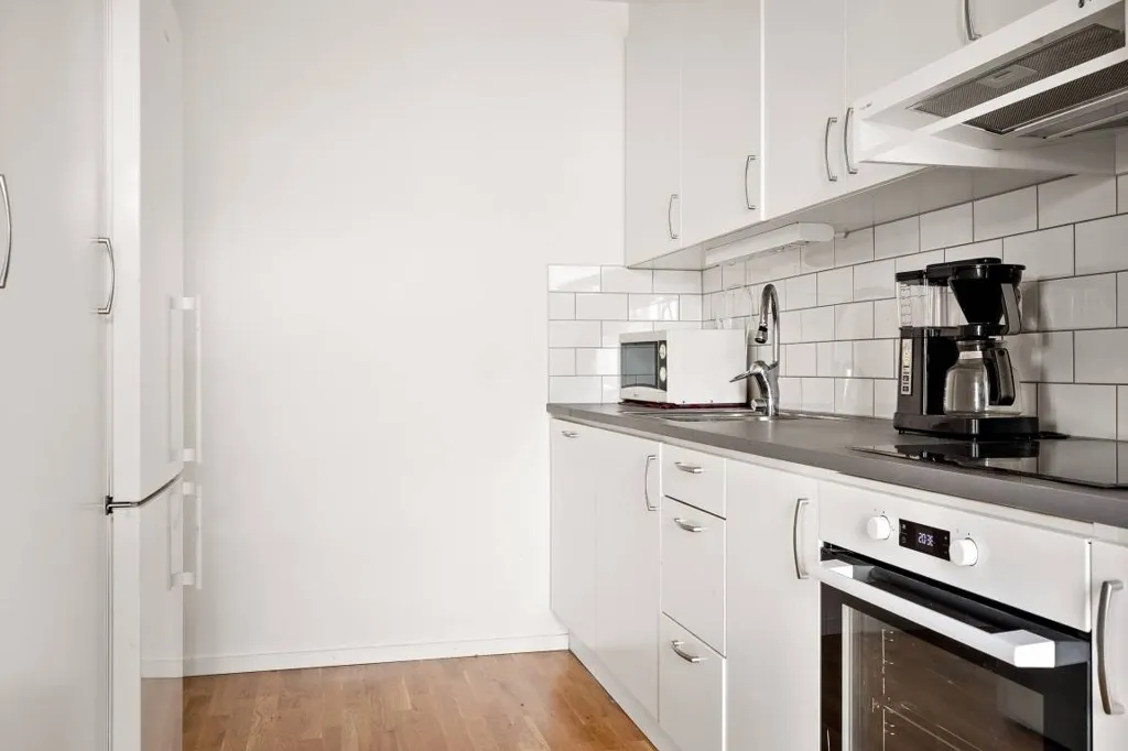 Kitchen - Modern Flat with Balcony in Enköping Centre