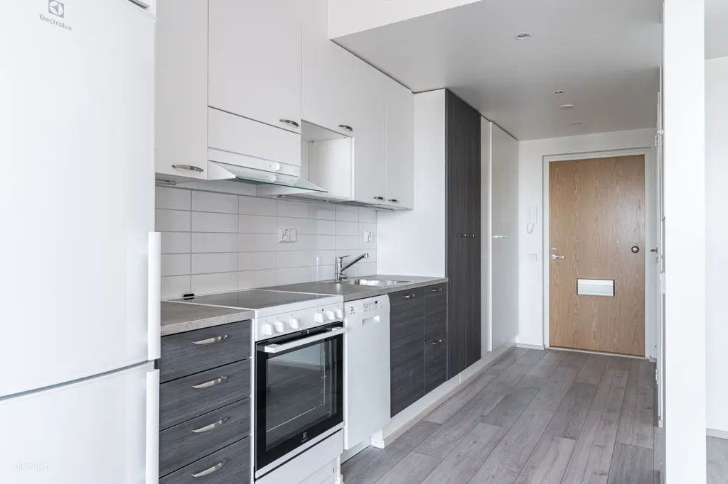 Kitchen - Modern Flat with Balcony in Keimola, Vantaa